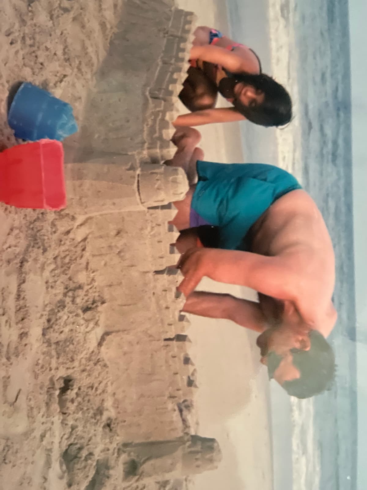Kerry building a sandcastle at the beach