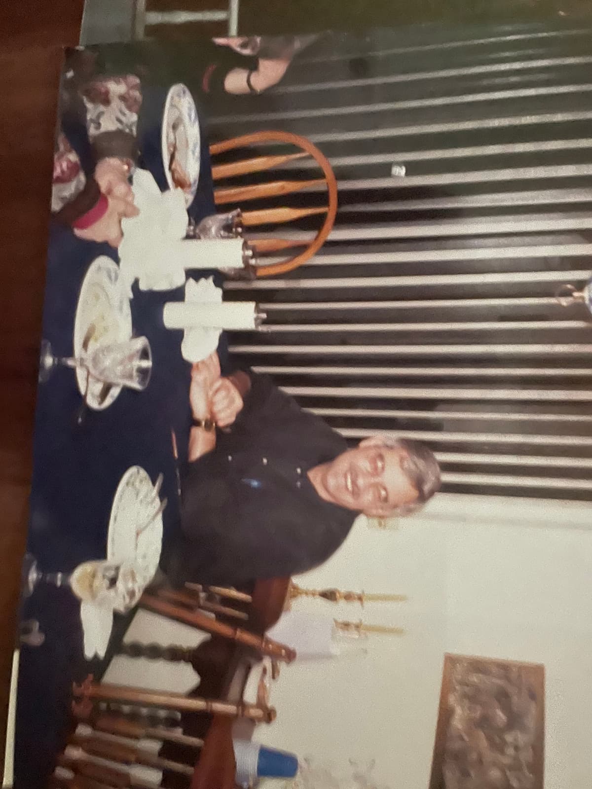 Kerry smiling at the dinner table