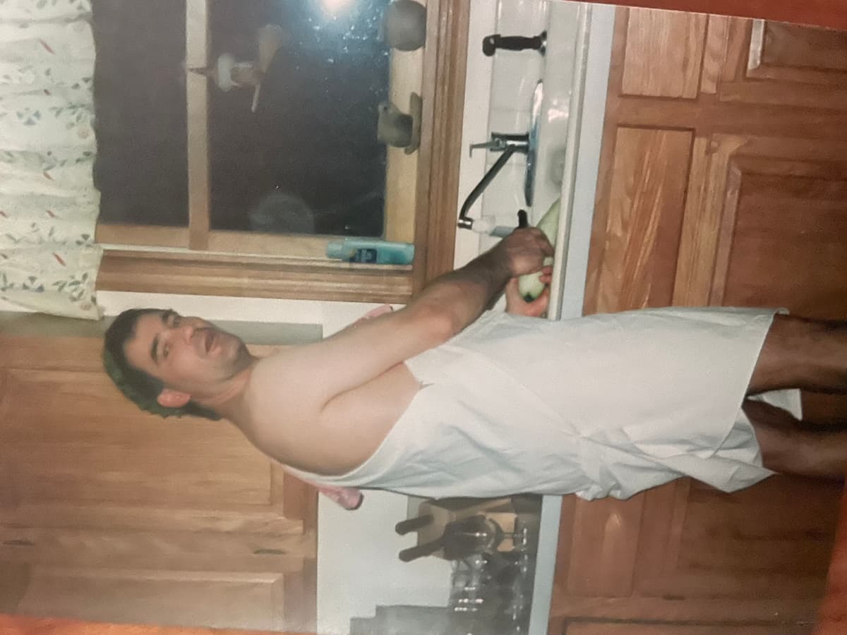 Kerry in a toga at a party